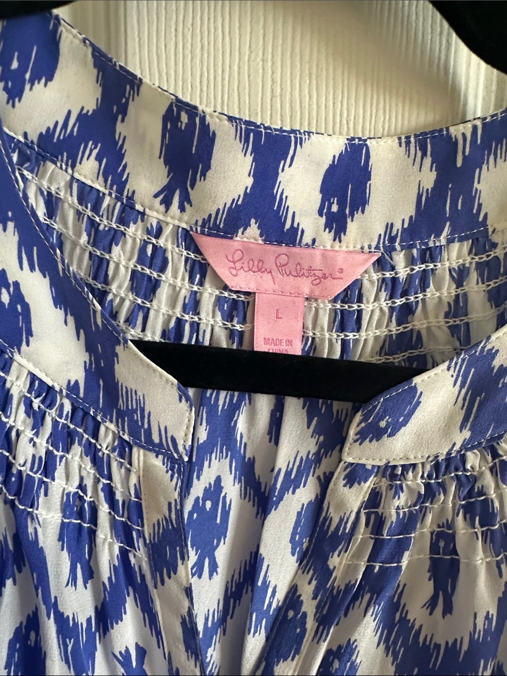 Woman’s Blue Ikat Print Sleeveless Shirt - Picture 2 of 5